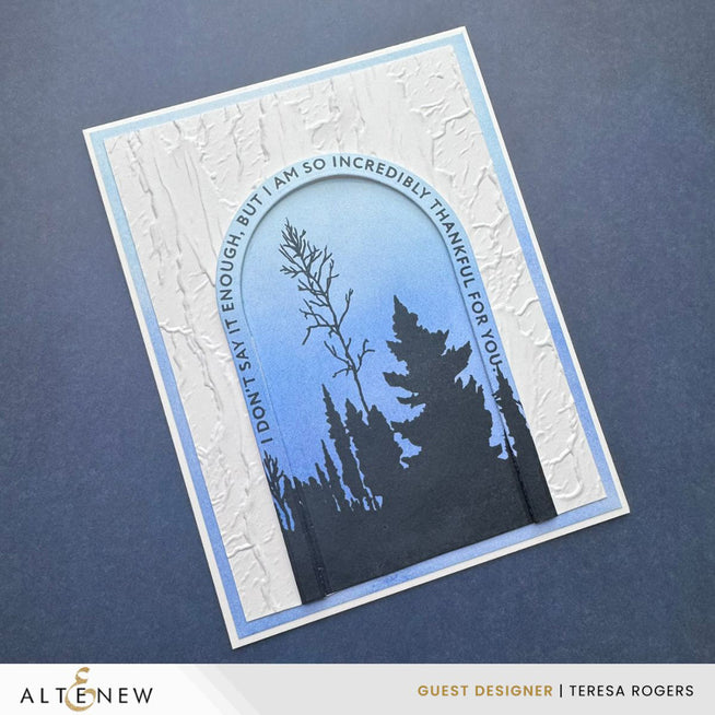 Altenew arched sentiments clear stamp set with woodland silhouette and weathered bark design on transparent rubber for crafting projects.