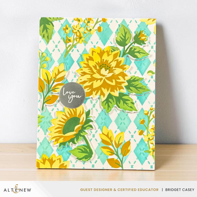 Altenew Botanical Argyle layering stencil set with six stencils and circular sentiments plate, used for creating layered botanical designs.