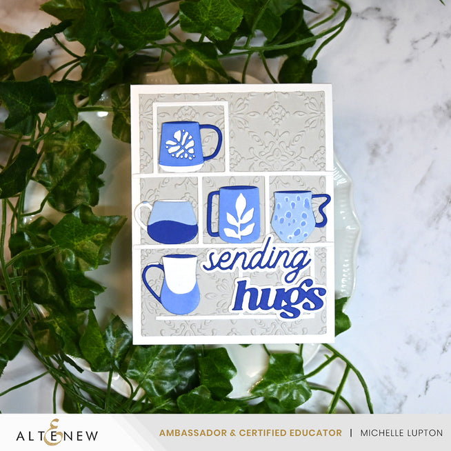Altenew My Favorite Mugs Layering Die Set with intricate mug and sentiment dies on a white background.